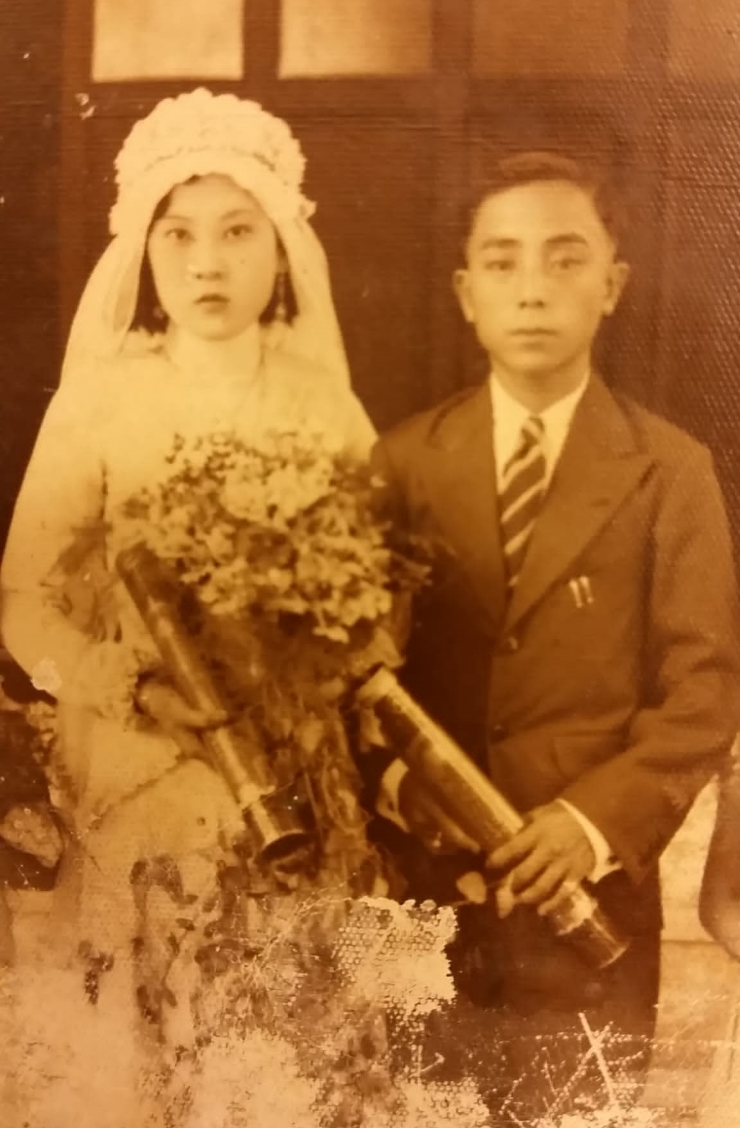 An 18-year-old Mdm Soh in her wedding finery with Mr Goh. Photo provided by Mdm Soh’s family.