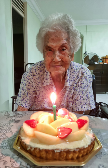 Mdm Soh having a quiet birthday celebration at home this year instead of the big parties of yester-years due to the ongoing Covid-19 pandemic. Photo provided by Mdm Soh’s family.