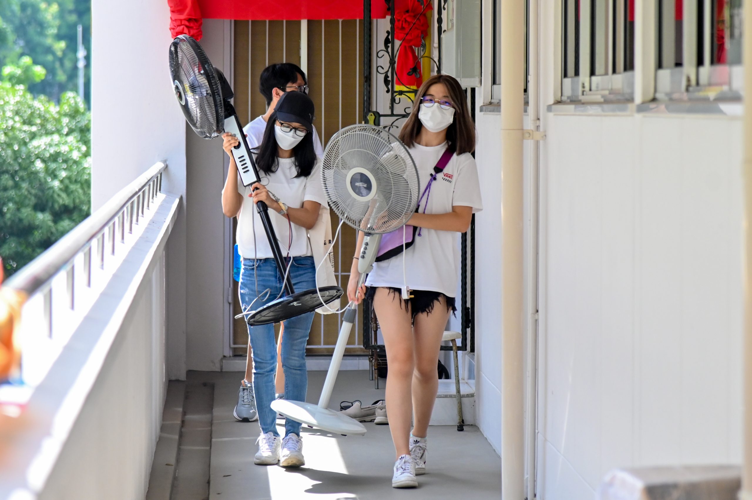 The youths went door-to-door collecting e-waste and old textiles.