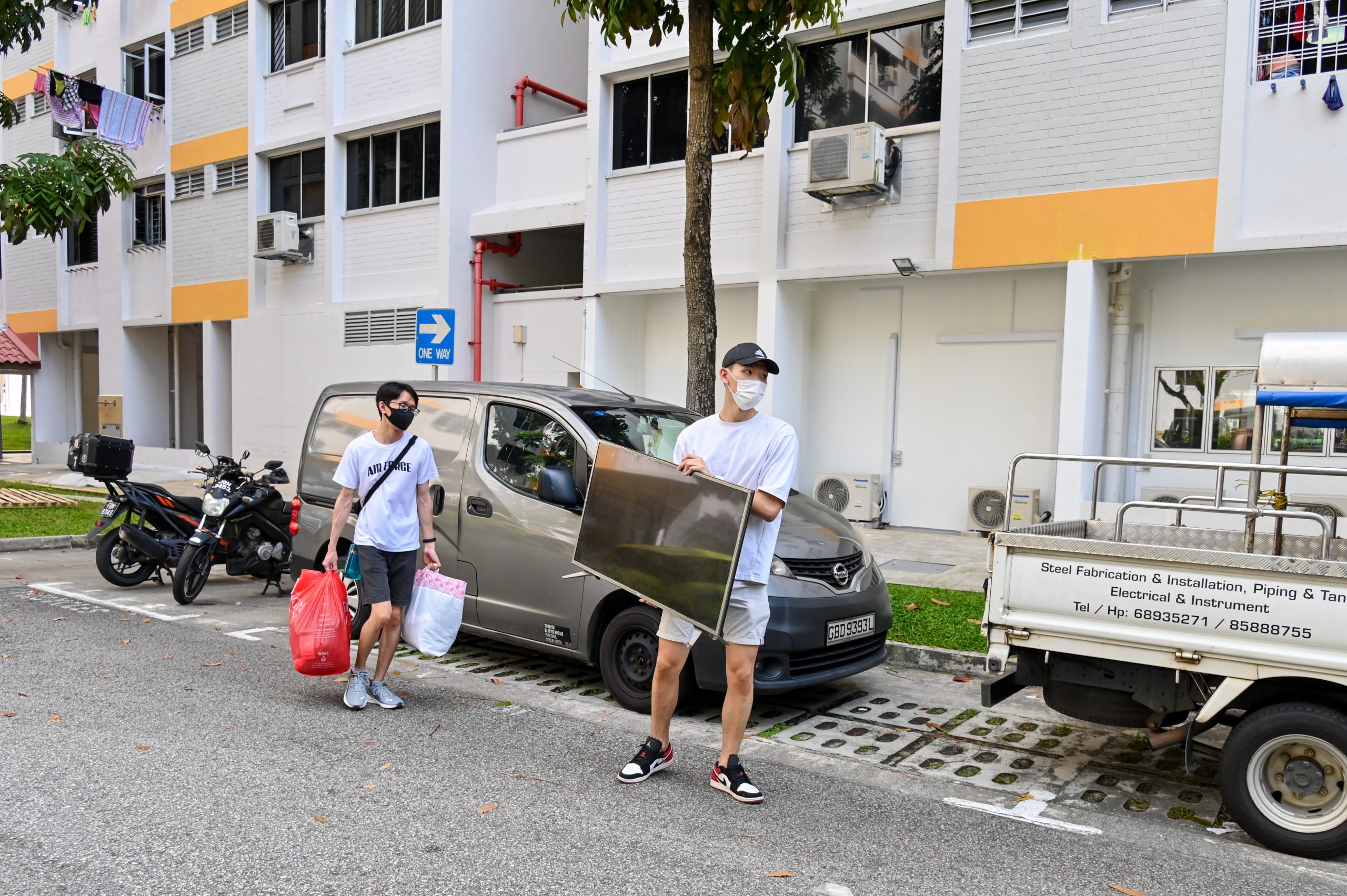 The youths went door-to-door collecting e-waste and old textiles.