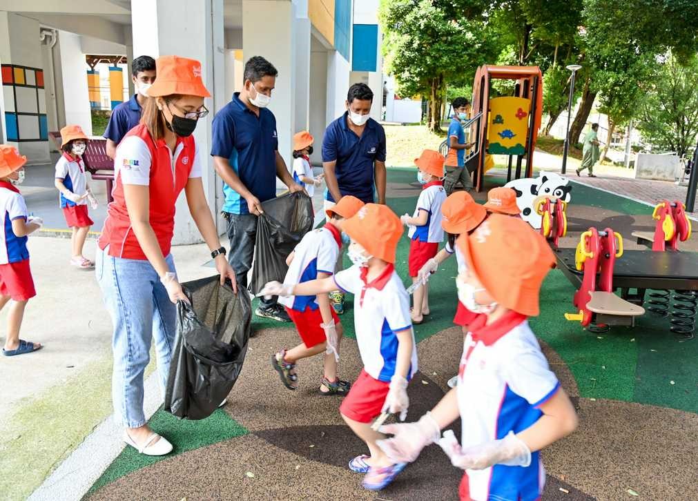 PCF Sparkletots preschoolers at Blk 3 Teck Whye Ave taking part in litter-picking drive.