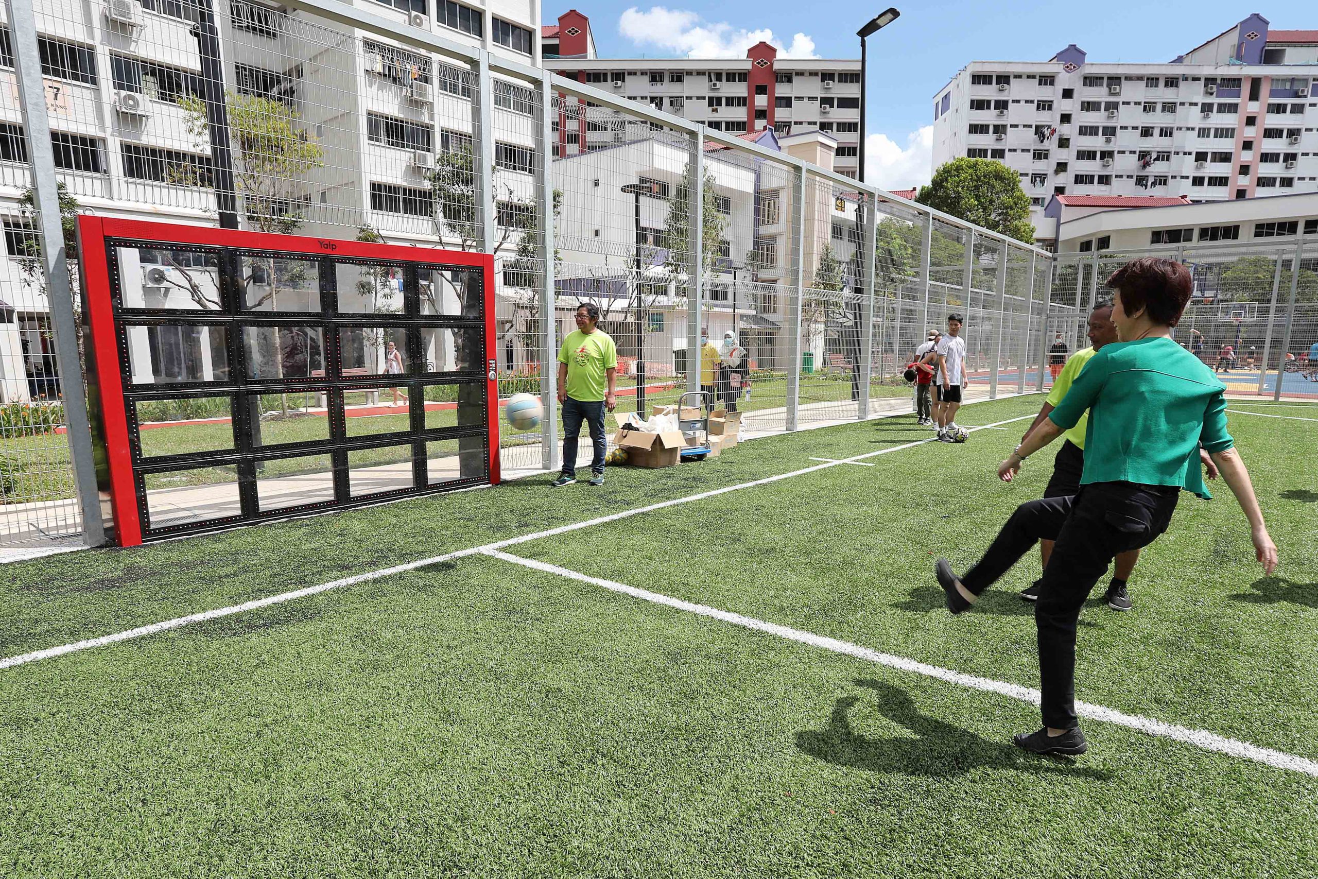 South West District Mayor & CCK Town Council Chairman Low Yen Ling checked out the futsal pitch with its interactive ball wall.