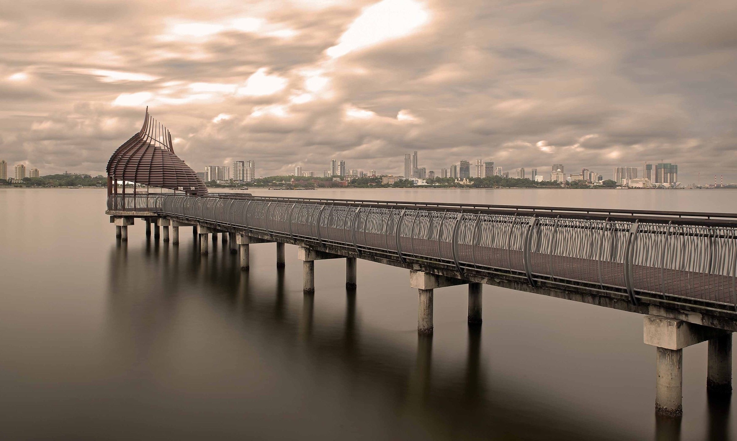 The long exposure he used for his photo (above) revealed a magical landscape where the water and clouds appeared milky and blurry, as if in a painting.
